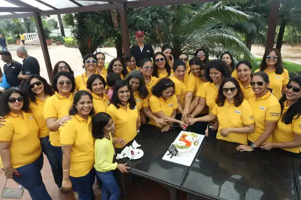 Ladies Reunion Polo Shirts 51ICC | iLogo Women of the 51st ICC wearing tailormade yellow Polo Shirts - Delivered in